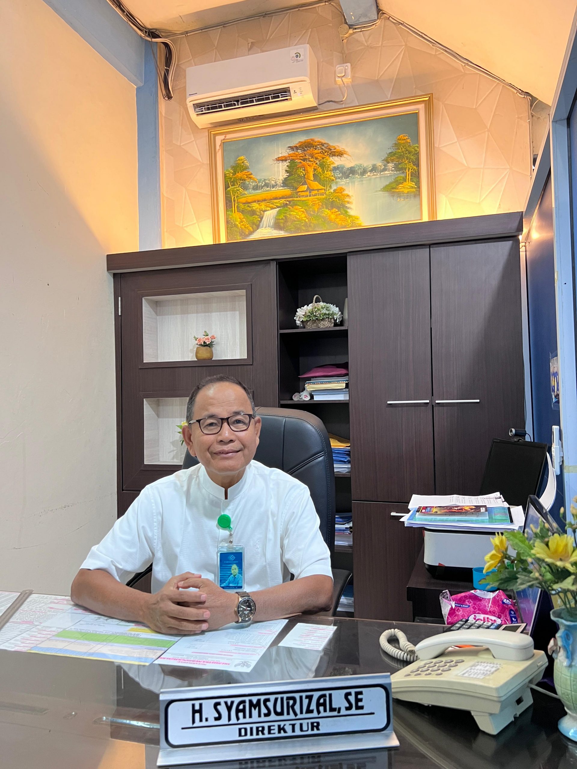 SYAMSURIZAL, SE